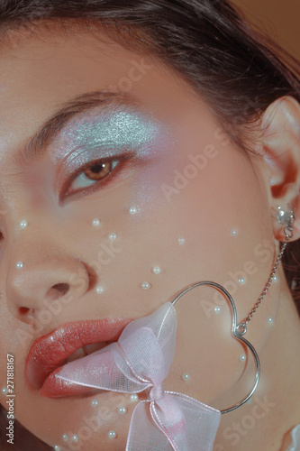 Woman with sparkly eyeshadow photo