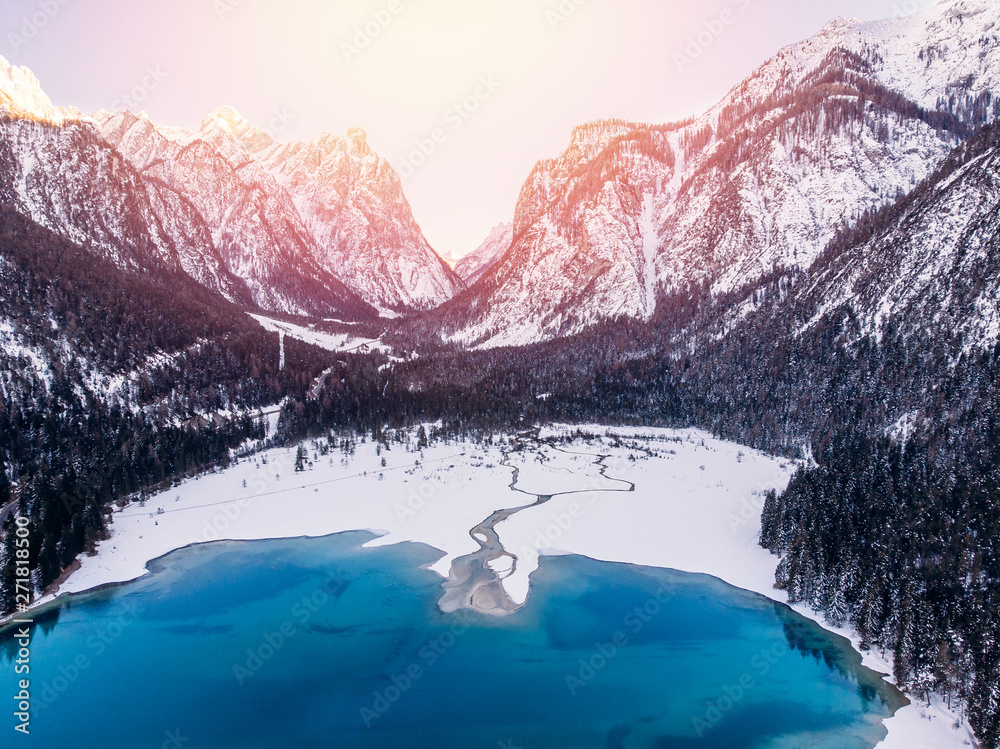 Misurina lake sunset blue winter Dolomites Val di Funes valley, Italy. Aerial top view