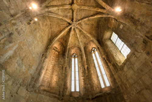 Windows and stone ceiling inside the ancient Gothic building of old church