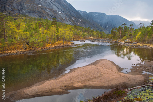 Norway nature landscape, river in the national park valley of the Husedalen waterfalls at sunset photo