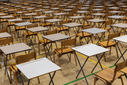 Exam tables set up in a sports hall for exams in a high school & sixth form photo