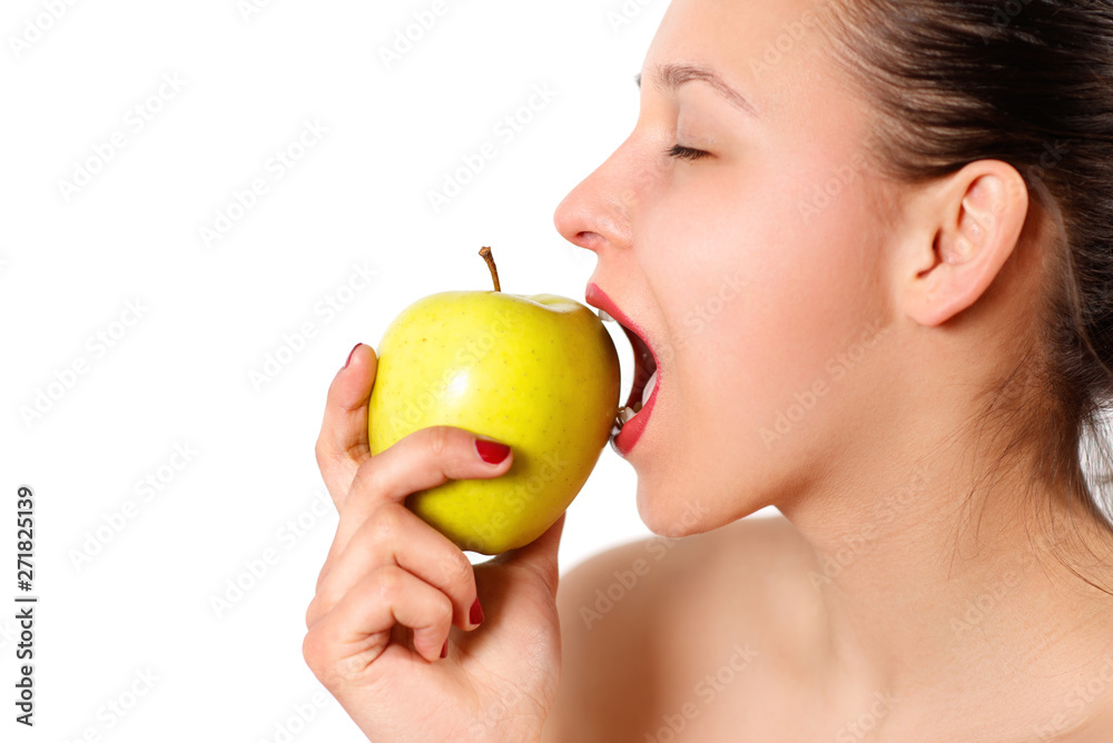 Cheerful beautiful woman eating apple, isolated over white background Cheerful beautiful woman eating apple, isolated over white background