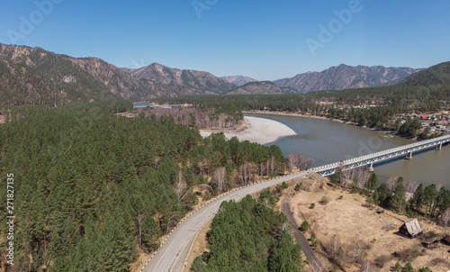 Aerial view of a road in summer landscape, in Altai mountains