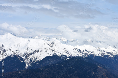 Beautiful view of the snow-capped mountains. Background. Sochi city, Rose Peak. © boggarti