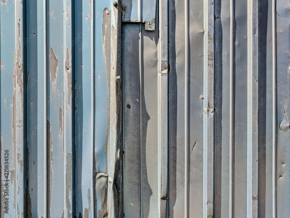 Bent and old metal siding Bent and old metal siding