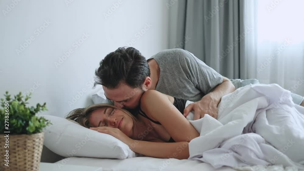 Happy couple lover on bed, hug and kiss in romantic time, love and passionate concept.