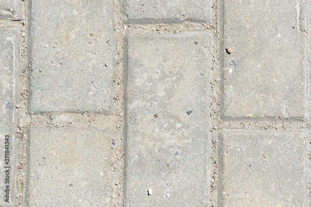 Gray paving slabs texture close up. Paving slabs background Gray paving slabs texture close up. Paving slabs background