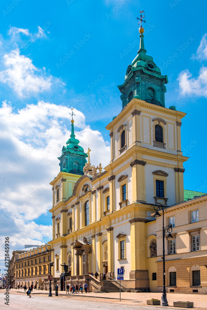 Warsaw, Poland - Front view of the baroque Holy Cross Church, at the Krakowskie Przedmiescie street in the Old Town quarter of Warsaw Warsaw, Poland - Front view of the baroque Holy Cross Church, at the Krakowskie Przedmiescie street in the Old Town quarter of Warsaw