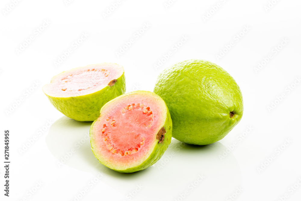 Red guava cut on white background.