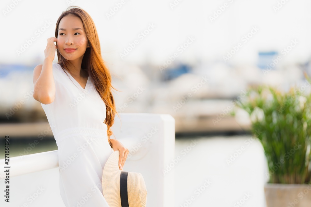 Portrait beautiful young asian woman leisure smile happy relax around yacht port Portrait beautiful young asian woman leisure smile happy relax around yacht port