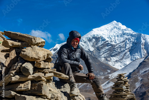 tourist on the background of the Himalayas, Nepal. Manang village, December 2017 photo