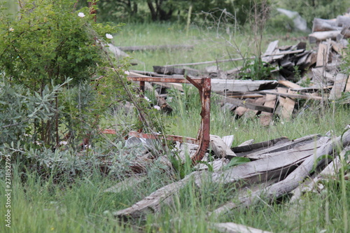 old wooden abondoned construct in forest