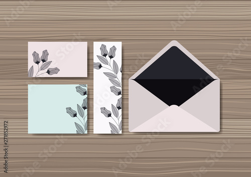 envelope with invitation and floral decoration