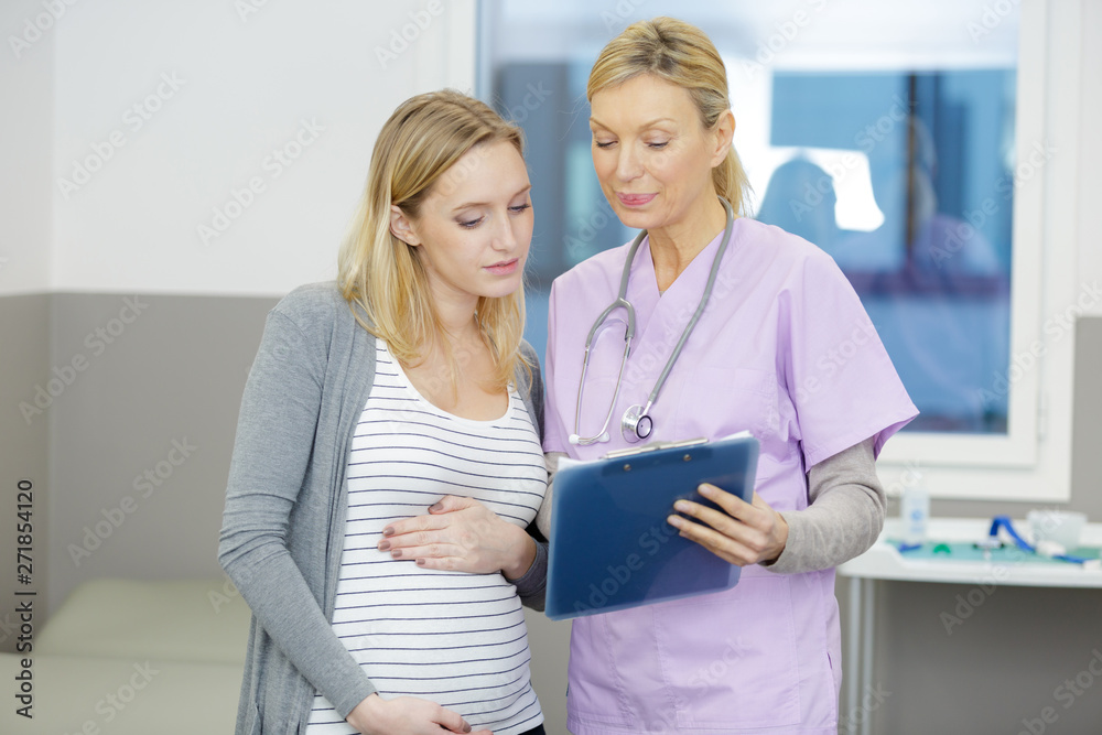 doctor with pregnant woman in hospital doctor with pregnant woman in hospital