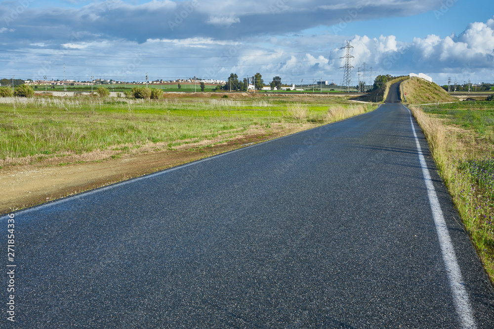 A road in a cloudy day A road in a cloudy day