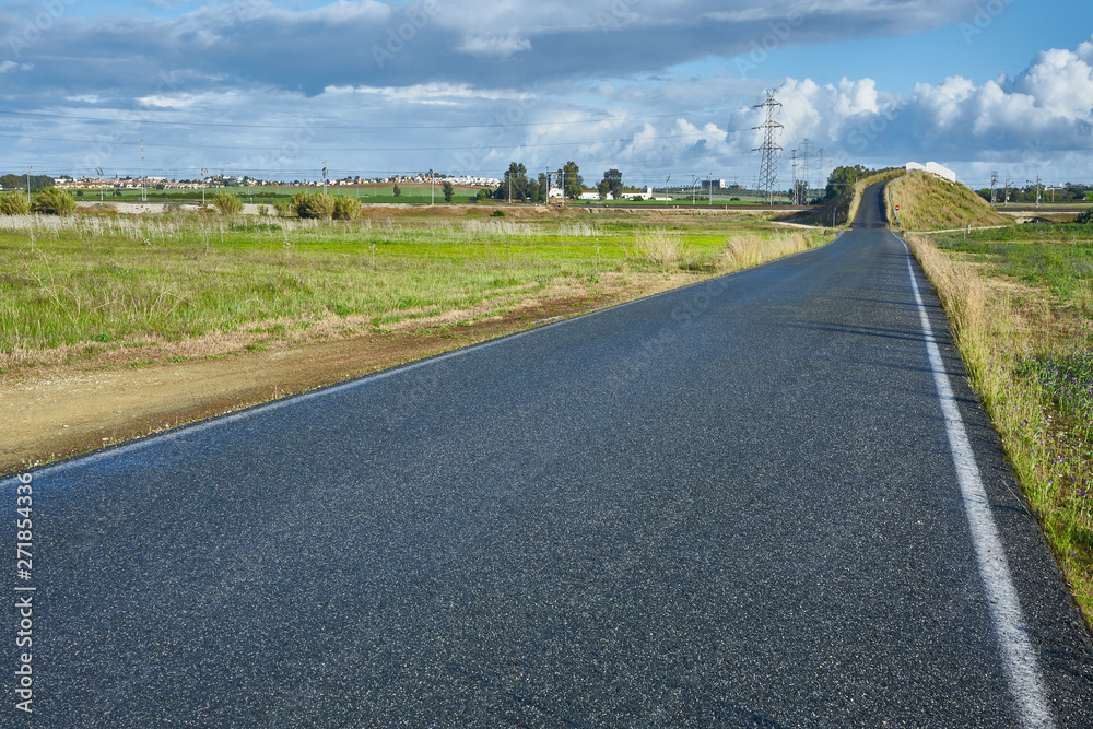 A road in a cloudy day