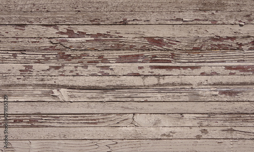 Close up view of a section of an old massive building wall made of wood planks