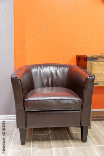 leather chair, orange wall #2