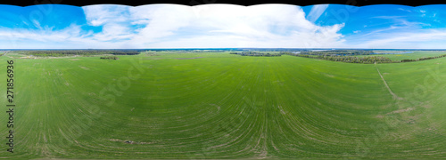 360 panoramic view from the air without the sky on green agricultural fields
