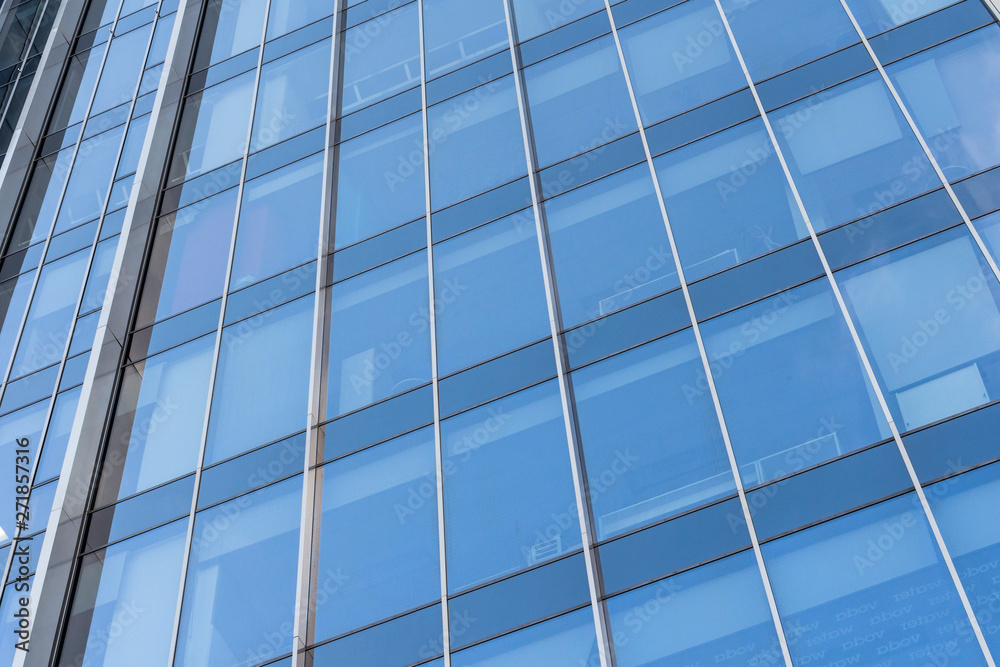 closeup of a modern window glass building reflecting closeup of a modern window glass building reflecting