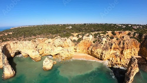 Aerial view on Praia de Marinha, most beautiful beach in Algarve Portugal. View from above on coast of Atlantic Ocean. 