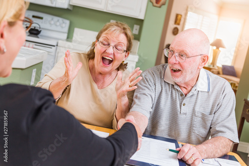 Senior Adult Couple Celebra...