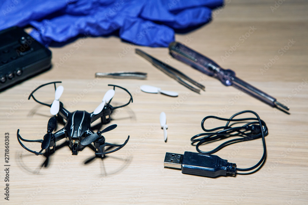 quadcopter glove screw driver table background quadcopter glove screw driver table background