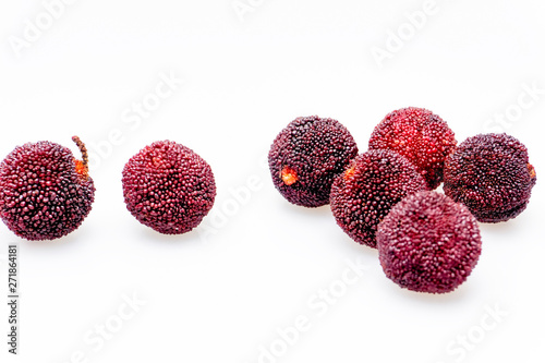 Red bayberry with white background.. photo