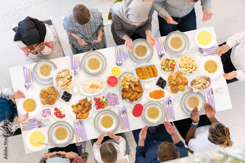 Fotografie, Obraz top view of modern muslim family having a Ramadan feast