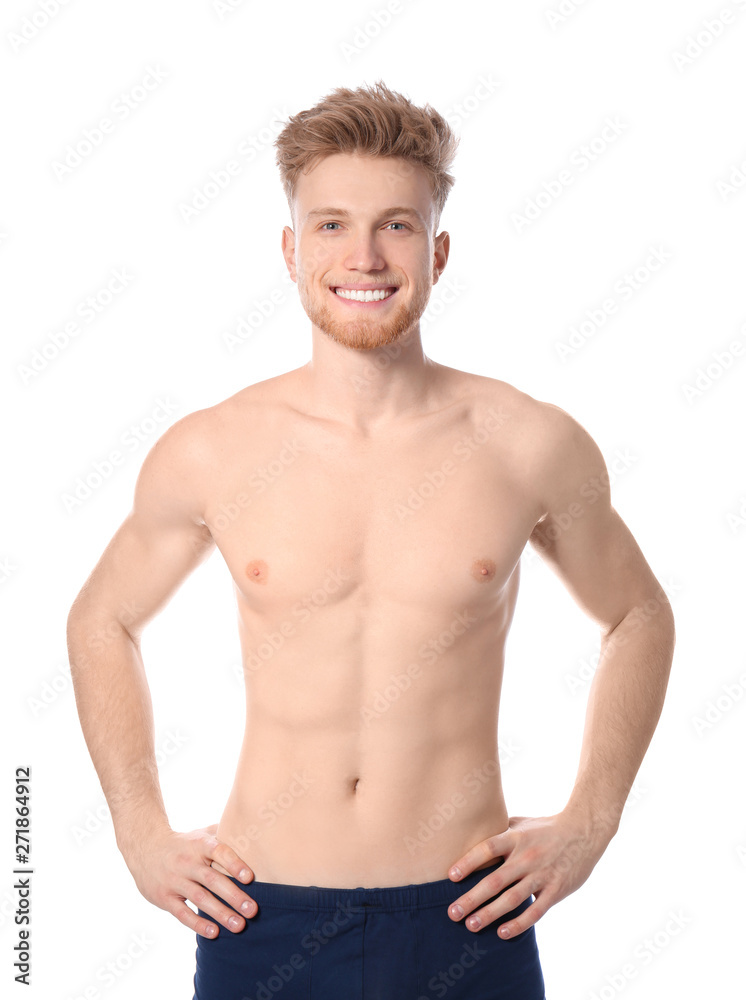 Portrait of young man with slim body on white background Stock