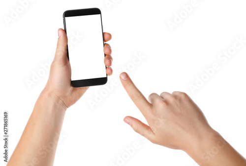 Man holding smartphone with blank screen on white background, closeup of hands. Space for text