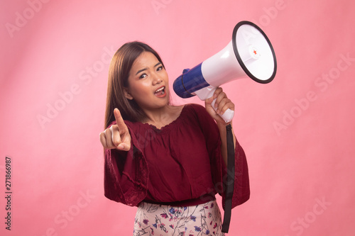Beautiful young Asian woman announce with megaphone.
