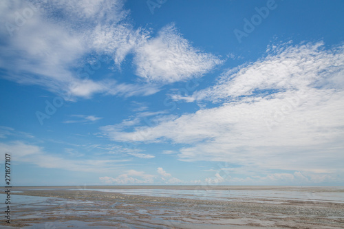 Sand blue sky and clouds