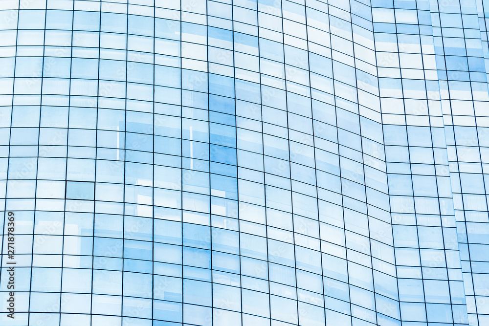Blue glass windows of office building Blue glass windows of office building
