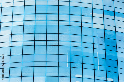 Blue glass windows of office building