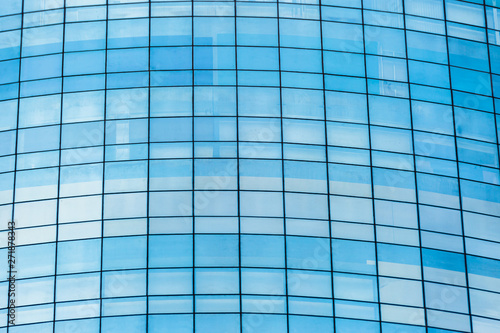 Blue glass windows of office building