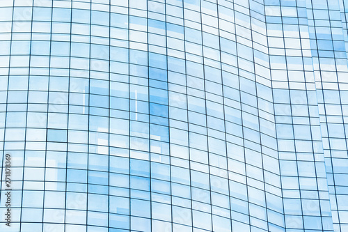 Blue glass windows of office building