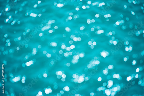 Abstract bokeh from light in the blue pool