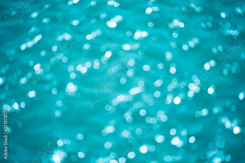 Abstract bokeh from light in the blue pool