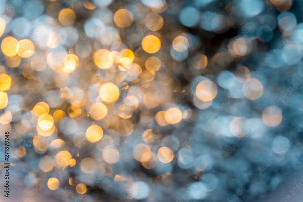 Abstract gold and white bokeh