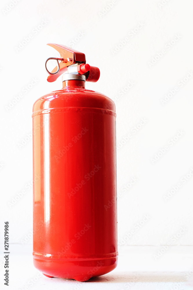 Red Fire extinguisher, Fire extinguisher available in fire emergencies Red Fire extinguisher, Fire extinguisher available in fire emergencies