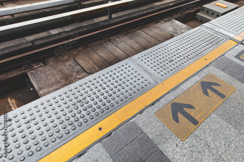 arrow symbol on platform sky train