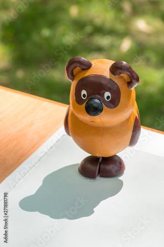 doll bear standing on the table