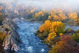 View of Southern Bug River and rocks at calm autumn morning in reserve Buzsky Gard, Migeya, Mykolaiv region, Ukraine. View from above