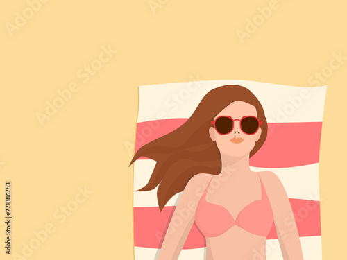 Girl sunbathing  at the beach