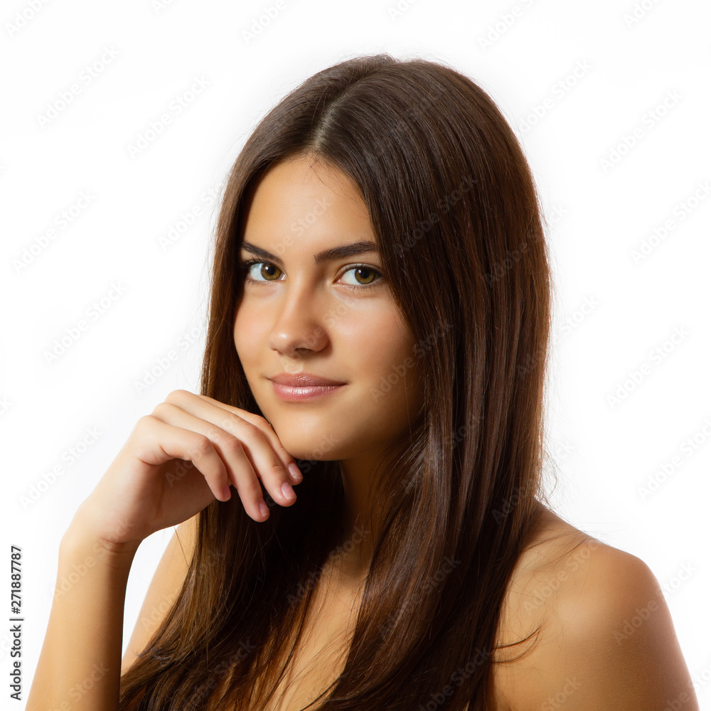 Beauty feminine portrait of female face with healthy natural skin. Beautiful tanned teen girl with long brown hair looking at camera. Pretty attractive young woman posing at studio, isolated on white Beauty feminine portrait of female face with healthy natural skin. Beautiful tanned teen girl with long brown hair looking at camera. Pretty attractive young woman posing at studio, isolated on white