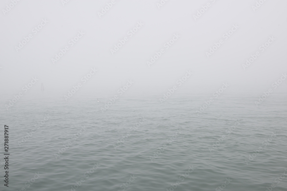 Mediterranean sea in fog. Foggy weather near italian island Burano, province of Venice, Italy. Mediterranean sea in fog. Foggy weather near italian island Burano, province of Venice, Italy.