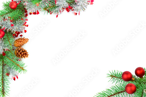 Christmas decorations. Elegant frame of Christmas tree decorations and spruce twigs. Free space for your text. photo