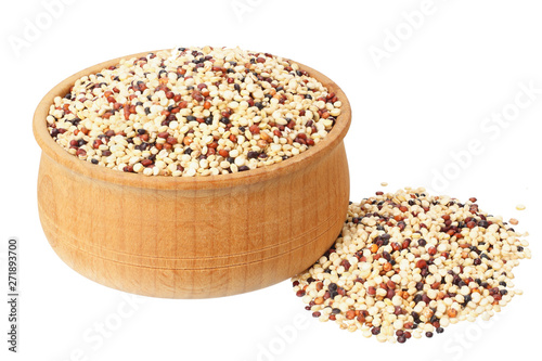 quinoa in a wooden bowl isolated on white background. quinoa seed
