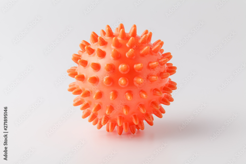 rubber ball for games with a dog isolated on white background. Massage ball rubber ball for games with a dog isolated on white background. Massage ball